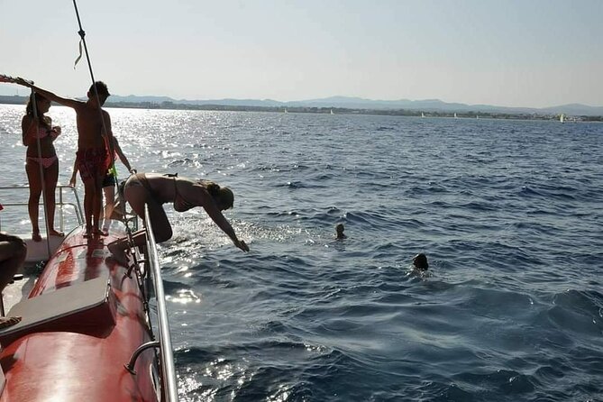 Sea Trip on Catamaran in Hammamet with Transfer - Swimming stops in turquoise water